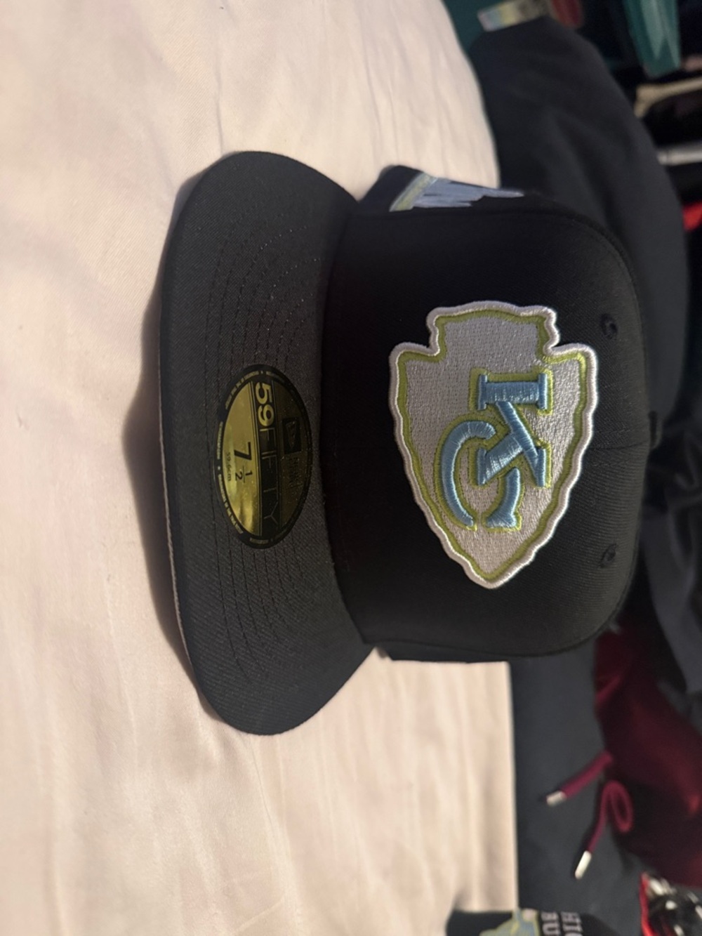 Black Fitted Cap with Embroidered Light Blue & Lime Logo